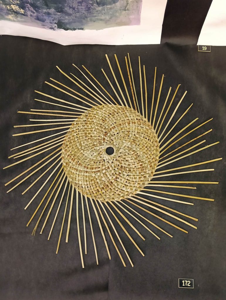 Woven harakeke Kōpae artwork made with natural fibres for the Riversdale Arts Exhibition.